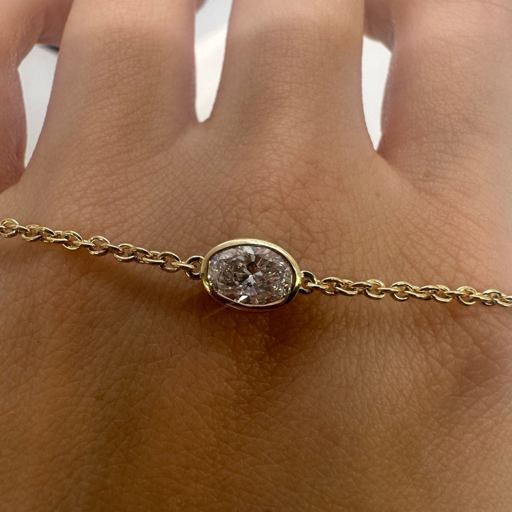 0.67 carat oval diamond bezel bracelet 14k yellow gold